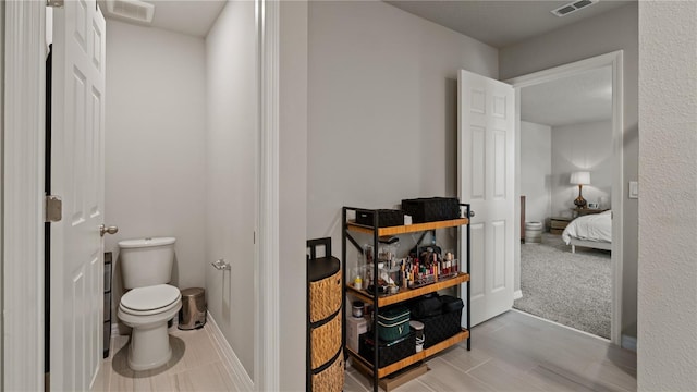 5291 Meredrew Ln, Saint Cloud, FL 34771 - ensuite bathroom featuring toilet