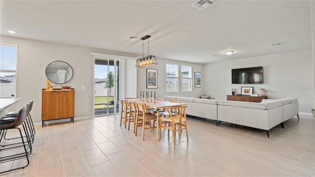 5291 Meredrew Ln, Saint Cloud, FL 34771 - dining space featuring baseboards and recessed lighting