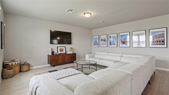 5291 Meredrew Ln, Saint Cloud, FL 34771 - living area with baseboards and wood tiled floors
