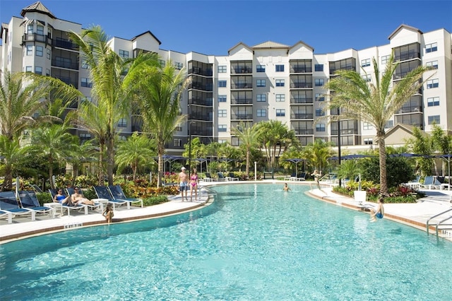 14501 Grove Resort Ave Unit 3737, Winter Garden, FL 34787 - community pool with a patio area