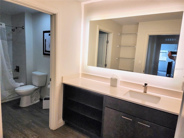 14501 Grove Resort Ave Unit 3737, Winter Garden, FL 34787 - full bathroom with toilet, wood finished floors, vanity, and shower / bath combo with shower curtain