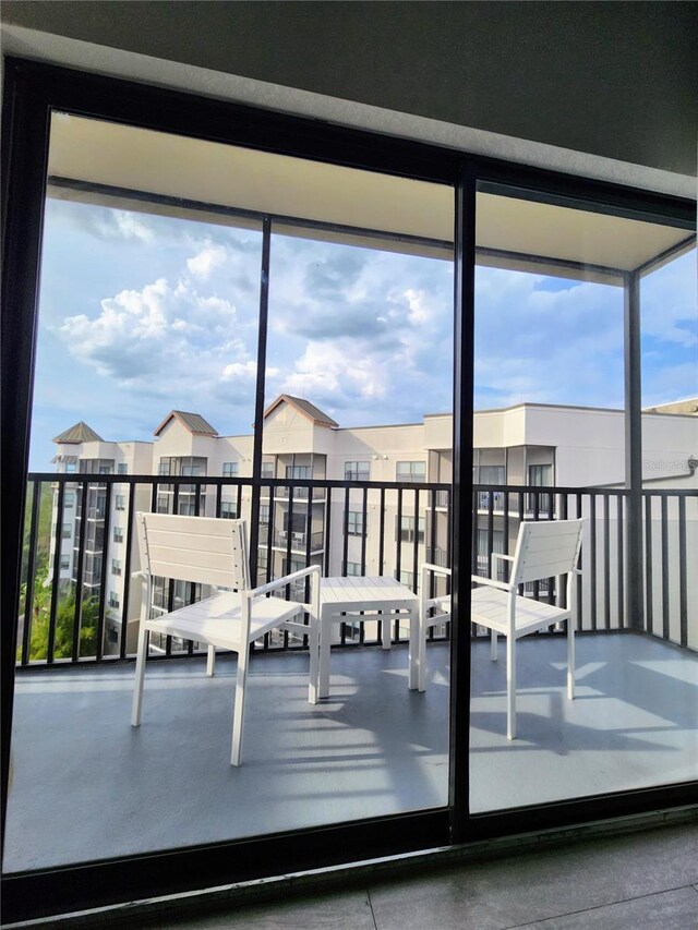 14501 Grove Resort Ave Unit 3737, Winter Garden, FL 34787 - unfurnished sunroom with plenty of natural light