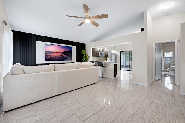 5729 Norman H Cutson Dr, Orlando, FL 32821 - living area with ceiling fan and vaulted ceiling