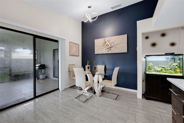 5729 Norman H Cutson Dr, Orlando, FL 32821 - dining room with baseboards