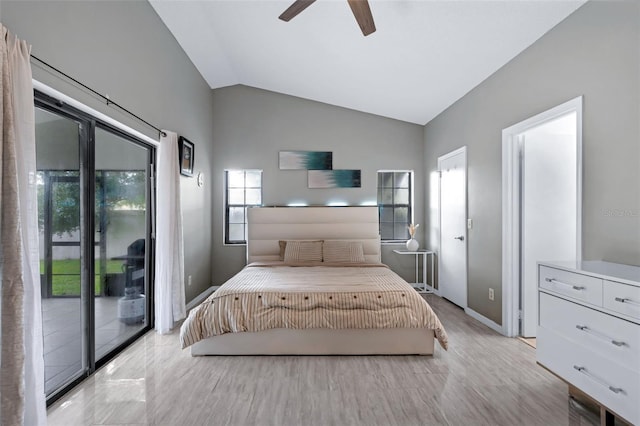 5729 Norman H Cutson Dr, Orlando, FL 32821 - bedroom featuring access to exterior, vaulted ceiling, baseboards, and a ceiling fan