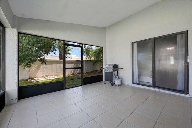 5729 Norman H Cutson Dr, Orlando, FL 32821 - unfurnished sunroom featuring healthy amount of natural light