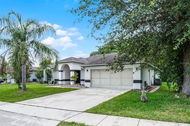2888 Middleton Cir, Kissimmee, FL 34743 - ranch-style home with stucco siding, a garage, a front yard, driveway, and a shingled roof