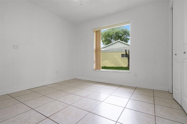 2888 Middleton Cir, Kissimmee, FL 34743 - unfurnished room featuring light tile patterned floors and baseboards