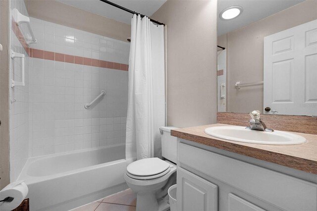 2888 Middleton Cir, Kissimmee, FL 34743 - full bathroom featuring vanity, shower / bath combo, toilet, and tile patterned floors