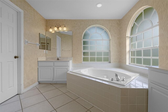 2888 Middleton Cir, Kissimmee, FL 34743 - full bath with vanity, a garden tub, tile patterned floors, and wallpapered walls