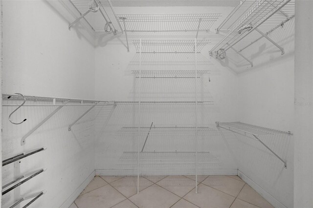 2888 Middleton Cir, Kissimmee, FL 34743 - walk in closet with tile patterned flooring