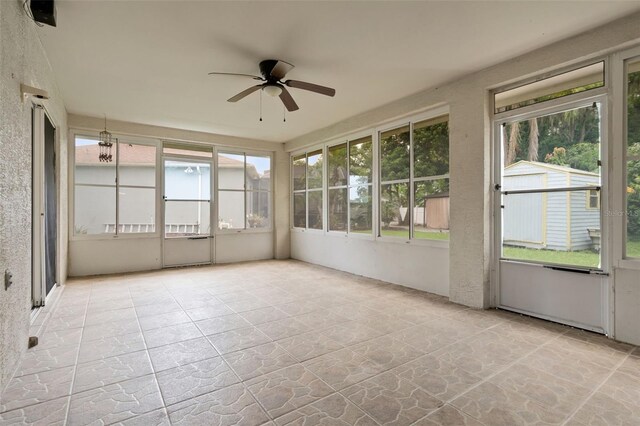 2888 Middleton Cir, Kissimmee, FL 34743 - unfurnished sunroom with ceiling fan and healthy amount of natural light