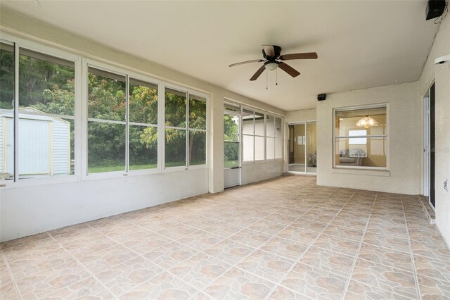 2888 Middleton Cir, Kissimmee, FL 34743 - unfurnished sunroom featuring a ceiling fan