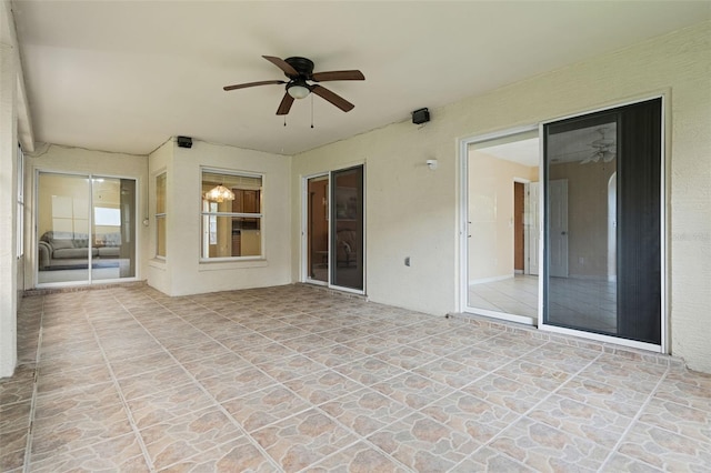 2888 Middleton Cir, Kissimmee, FL 34743 - unfurnished sunroom featuring ceiling fan
