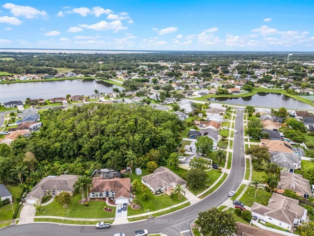 2888 Middleton Cir, Kissimmee, FL 34743 - aerial view of property and surrounding area with a nearby body of water and nearby suburban area