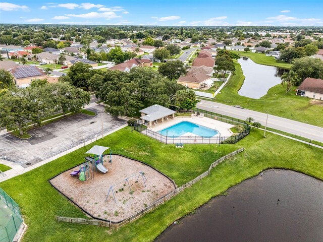 2888 Middleton Cir, Kissimmee, FL 34743 - aerial view of residential area featuring a nearby body of water and a pool area