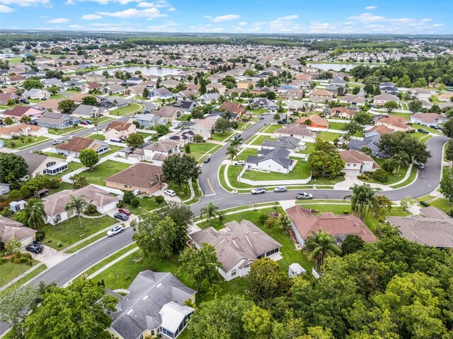 2888 Middleton Cir, Kissimmee, FL 34743 - aerial overview of property's location with nearby suburban area and a large body of water