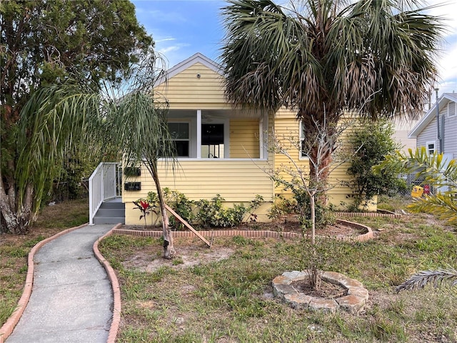 1834 28th Ave N, Saint Petersburg, FL 33713 - obstructed view of property with a porch