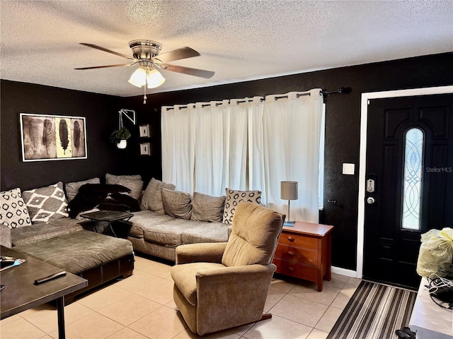 2 Clear Pl, Ocala, FL 34472 - living room with a textured ceiling, light tile patterned flooring, and a ceiling fan