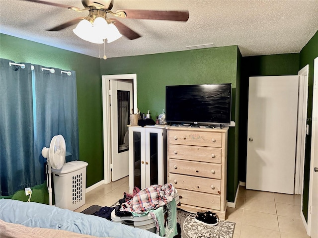 2 Clear Pl, Ocala, FL 34472 - bedroom featuring light tile patterned floors, a textured ceiling, and ceiling fan