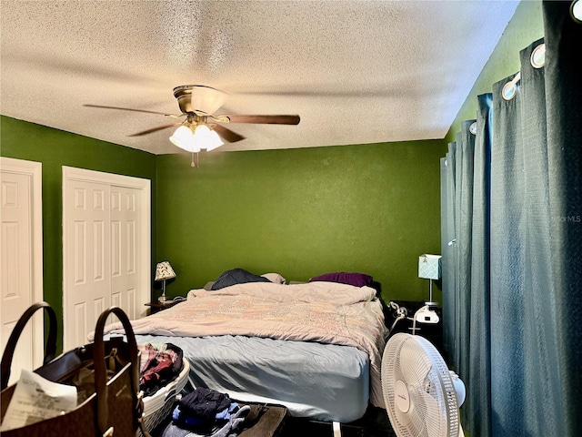 2 Clear Pl, Ocala, FL 34472 - bedroom featuring a textured ceiling and a ceiling fan