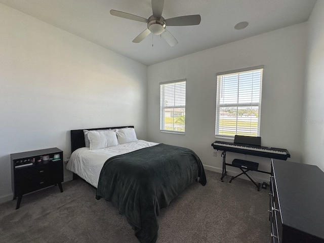 5161 Kingwell Cir, Oviedo, FL 32765 - carpeted bedroom with baseboards and ceiling fan