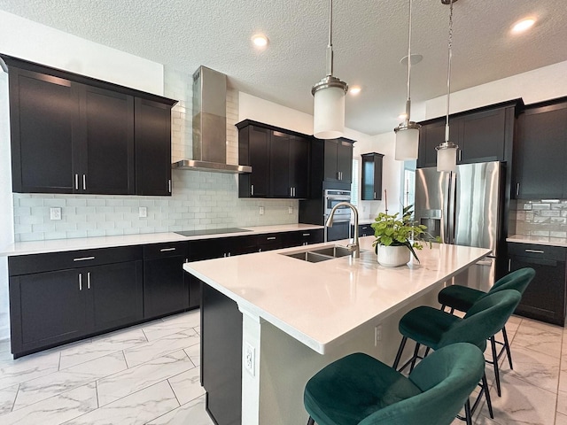 5161 Kingwell Cir, Oviedo, FL 32765 - kitchen featuring wall chimney range hood, a sink, light marble finish flooring, appliances with stainless steel finishes, and light countertops