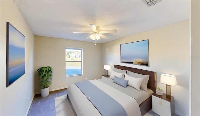 8520 La Isla Dr, Kissimmee, FL 34747 - bedroom featuring carpet, baseboards, ceiling fan, and a textured ceiling