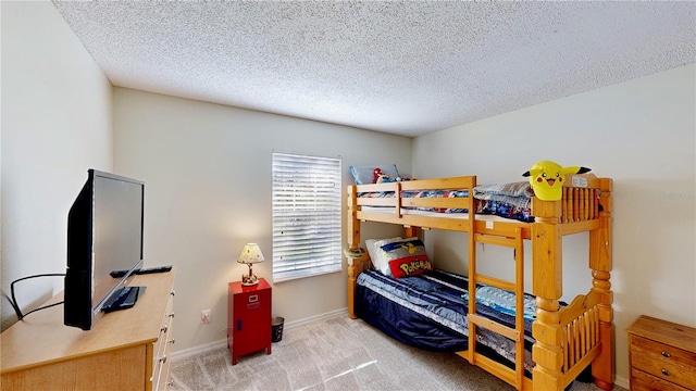 8520 La Isla Dr, Kissimmee, FL 34747 - bedroom featuring carpet, baseboards, and a textured ceiling