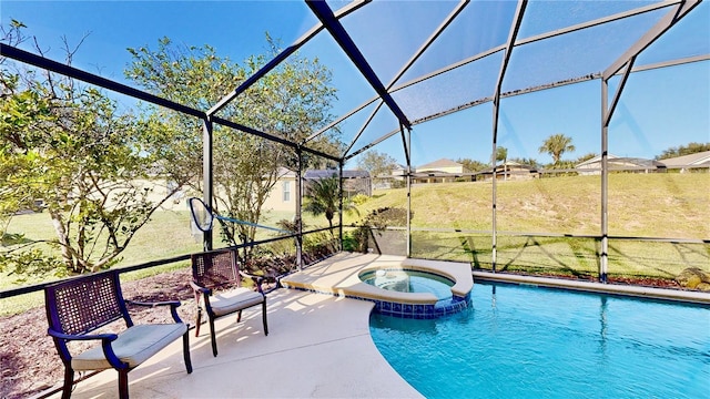 8520 La Isla Dr, Kissimmee, FL 34747 - view of pool featuring a lanai, a pool with connected hot tub, and a patio