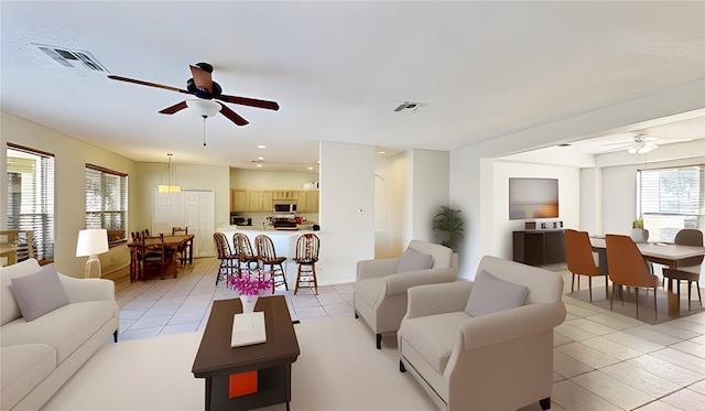 8520 La Isla Dr, Kissimmee, FL 34747 - living room featuring ceiling fan, light tile patterned floors, and recessed lighting