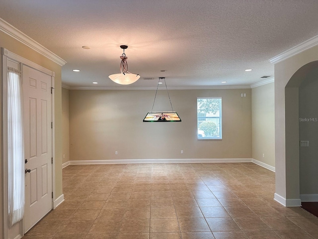 2585 Woodside Ridge Dr, Apopka, FL 32712 - tiled spare room featuring recessed lighting, arched walkways, baseboards, crown molding, and a textured ceiling