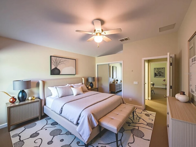 2585 Woodside Ridge Dr, Apopka, FL 32712 - bedroom featuring a closet, lofted ceiling, baseboards, ceiling fan, and carpet flooring