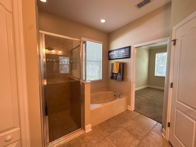 2585 Woodside Ridge Dr, Apopka, FL 32712 - bathroom featuring a whirlpool tub, a shower stall, tile patterned flooring, and recessed lighting