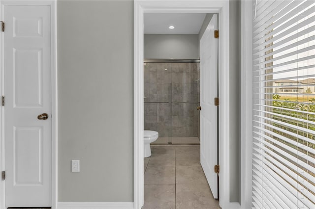 3137 Marine Grass Dr, Wimauma, FL 33598 - full bathroom featuring a stall shower, toilet, and tile patterned floors
