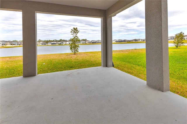 3137 Marine Grass Dr, Wimauma, FL 33598 - view of patio / terrace with a water view and a residential view