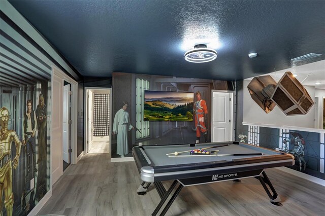 1533 Flange Dr, Davenport, FL 33896 - rec room with wood finished floors, billiards table, and a textured ceiling