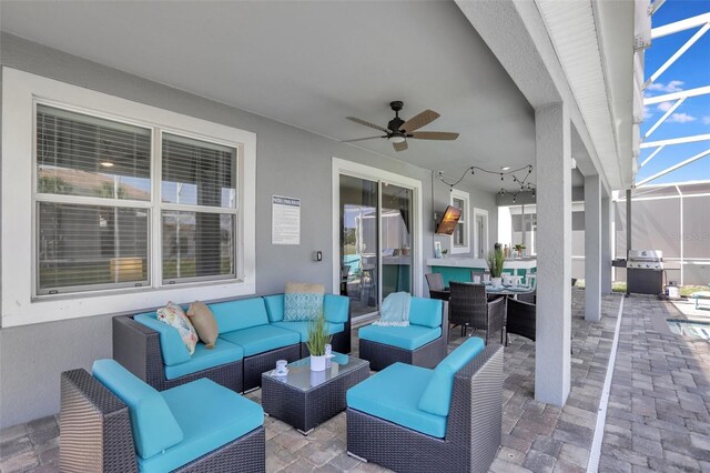 1533 Flange Dr, Davenport, FL 33896 - view of patio with outdoor lounge area, a ceiling fan, a grill, glass enclosure, and outdoor dining space