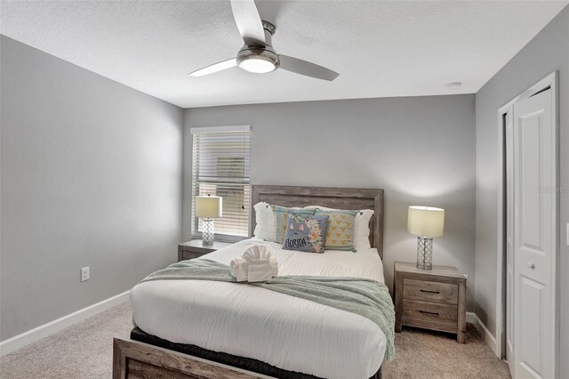 1533 Flange Dr, Davenport, FL 33896 - carpeted bedroom featuring baseboards and a ceiling fan