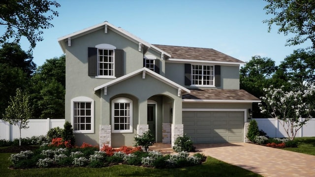 344 Switchgrass Loop, Minneola, FL 34715 - traditional home featuring stucco siding, a garage, driveway, a shingled roof, and stone siding