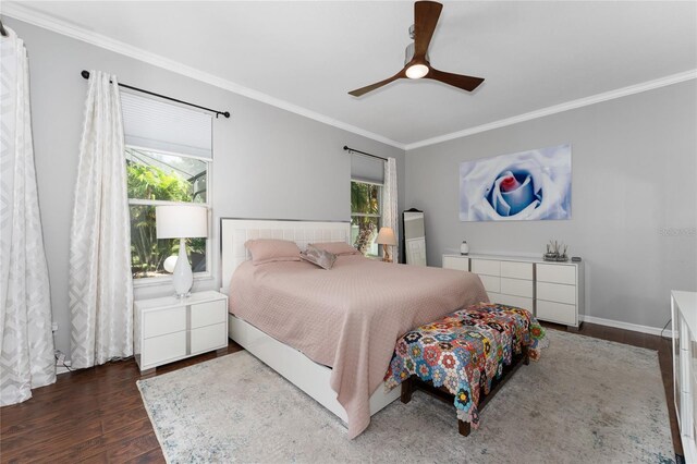 13108 Lakeshore Grove Dr, Winter Garden, FL 34787 - bedroom featuring wood finished floors, ornamental molding, multiple windows, a ceiling fan, and baseboards