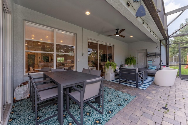 13108 Lakeshore Grove Dr, Winter Garden, FL 34787 - view of patio with a ceiling fan, outdoor lounge area, a lanai, and outdoor dining area
