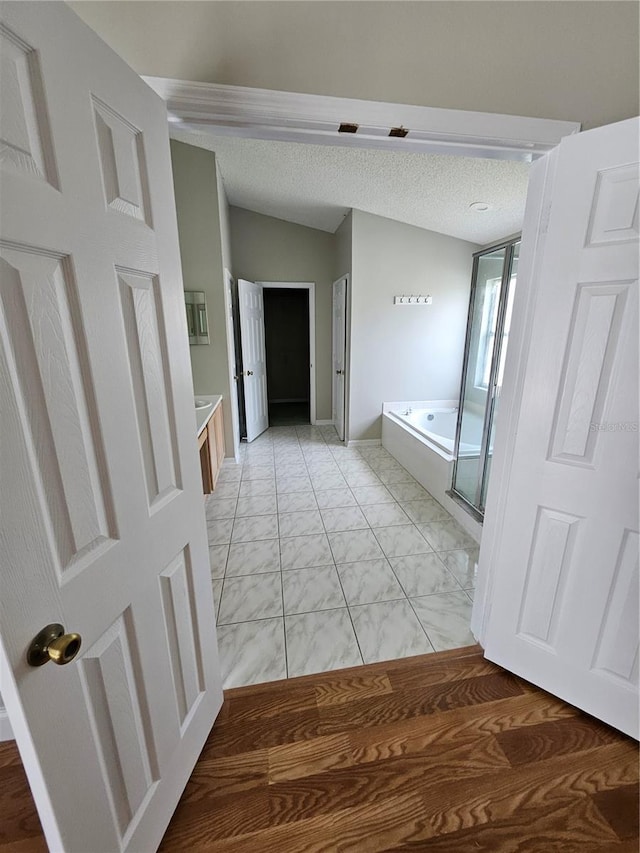 1710 Canoe Creek Rd, Oviedo, FL 32766 - full bath featuring a bath, marble look tile flooring, and vanity