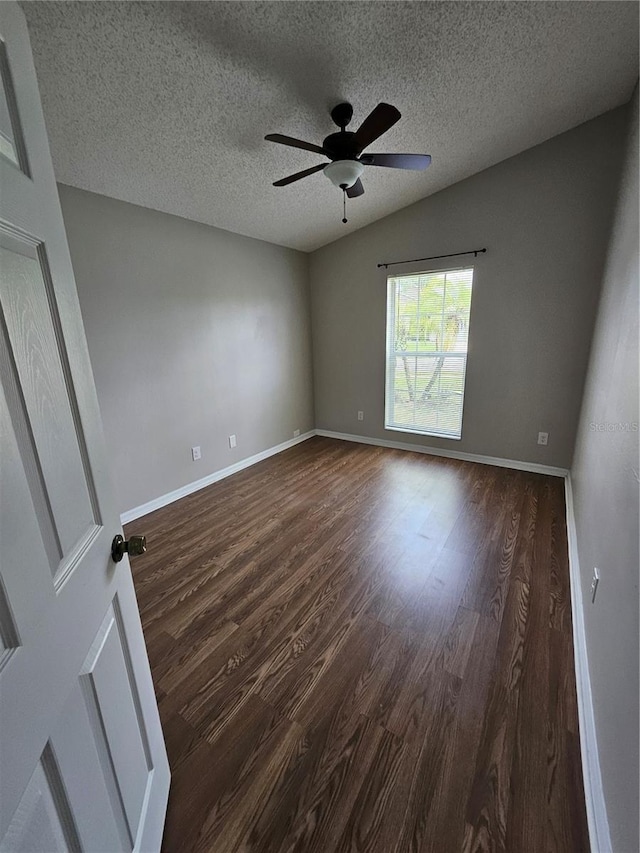1710 Canoe Creek Rd, Oviedo, FL 32766 - spare room with dark wood-style floors, ceiling fan, a textured ceiling, and baseboards