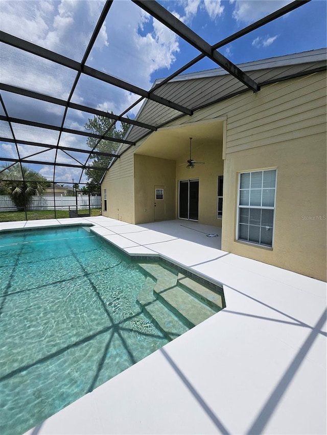 1710 Canoe Creek Rd, Oviedo, FL 32766 - view of swimming pool featuring a patio, ceiling fan, and glass enclosure