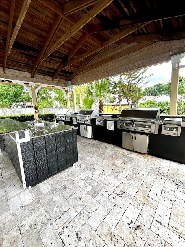 1057 S Hiawassee Rd Unit 1913, Orlando, FL 32835 - view of patio / terrace with a sink and an outdoor living space