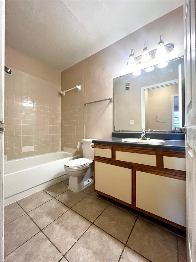1057 S Hiawassee Rd Unit 1913, Orlando, FL 32835 - full bathroom featuring shower / washtub combination, tile patterned flooring, vanity, and toilet