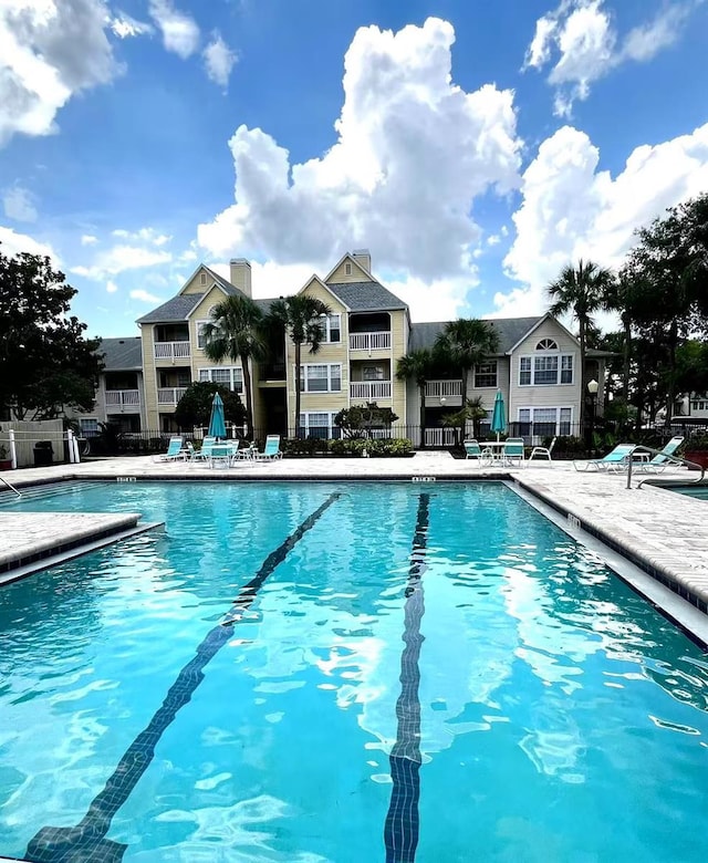 1057 S Hiawassee Rd Unit 1913, Orlando, FL 32835 - community pool with a patio