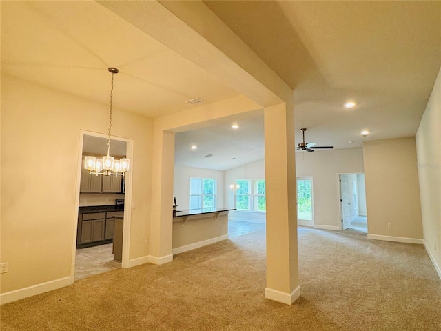 4326 Sagefield Dr, Harmony, FL 34773 - empty room with a chandelier, light carpet, baseboards, and recessed lighting