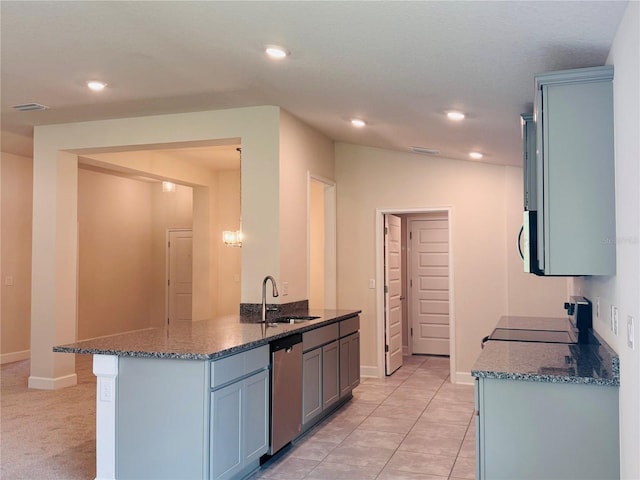 4326 Sagefield Dr, Harmony, FL 34773 - kitchen featuring dishwasher, a sink, range, dark stone counters, and recessed lighting